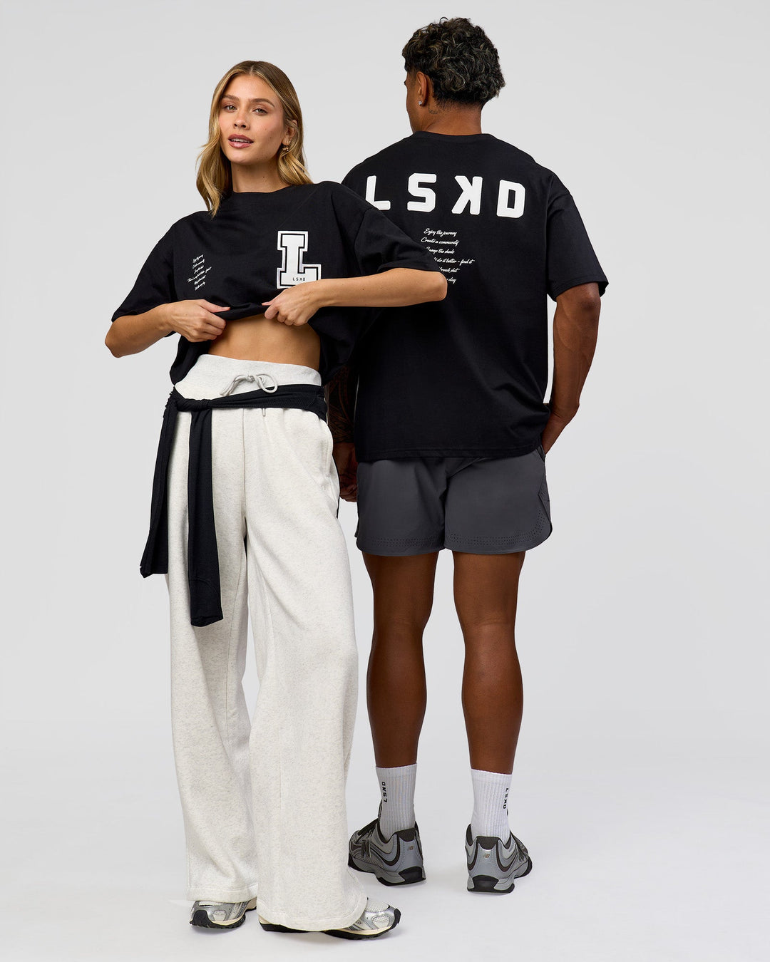 Duo wearing Hype Heavyweight Unisex Oversized Tee - Black-White | Model:Leilani | Size:XS | Model:Xavier | Size:L