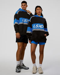 Duo wearing A-Team Oversized Hoodie - Caviar-Palace Blue | Model:Jackson | Size:L | Model:Loren | Size:XS