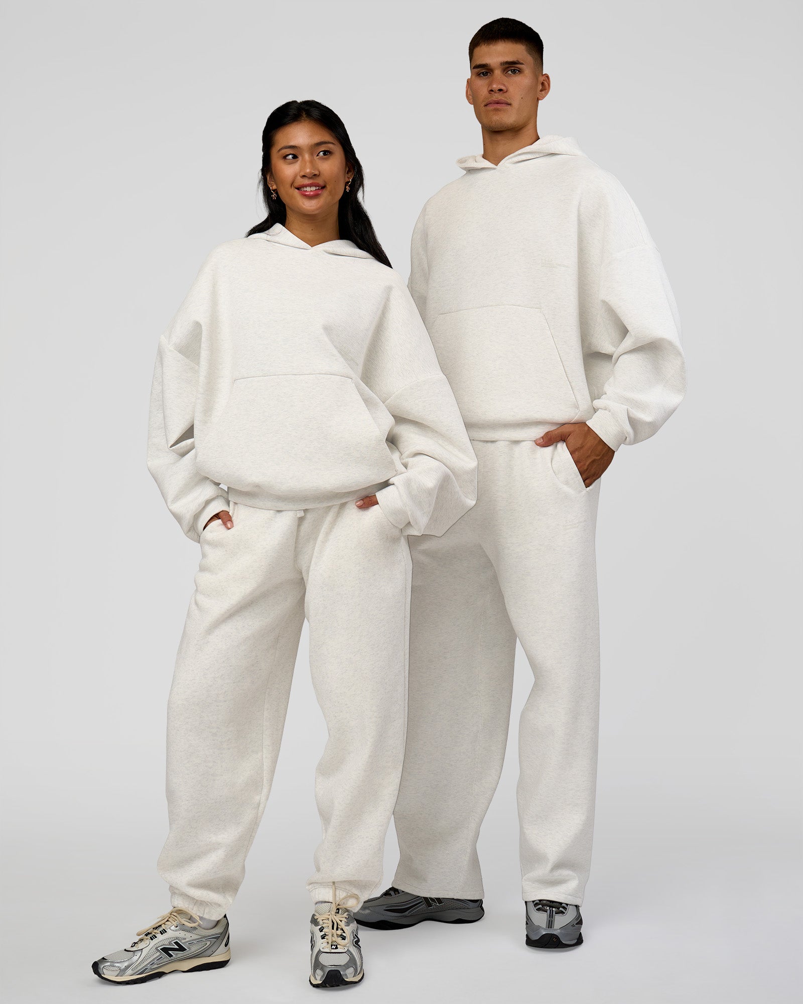 Duo wearing AfterDark ZeroCrease Oversized Hoodie - Silver Marl | Model:Both | Size:Duo