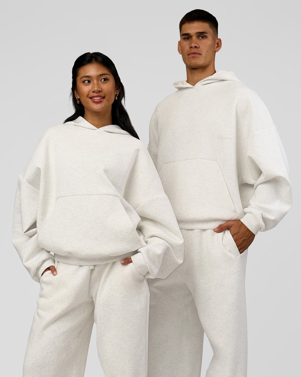 Duo wearing AfterDark ZeroCrease Oversized Hoodie - Silver Marl | Model:Both | Size:Duo - view 1