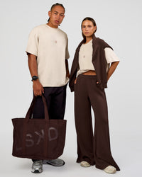 Duo wearing CF Unisex Oversized Heavyweight FLXCotton Tee - Clay-CF X LSKD Sport | Model:Malebo | Size:M | Model:Brylee | Size:XS