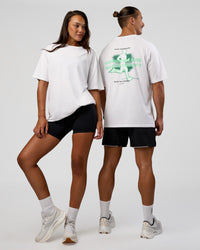 Duo wearing High Run FLXCotton Oversized Tee - White-Jelly Mint | Model:Both | Size:Duo