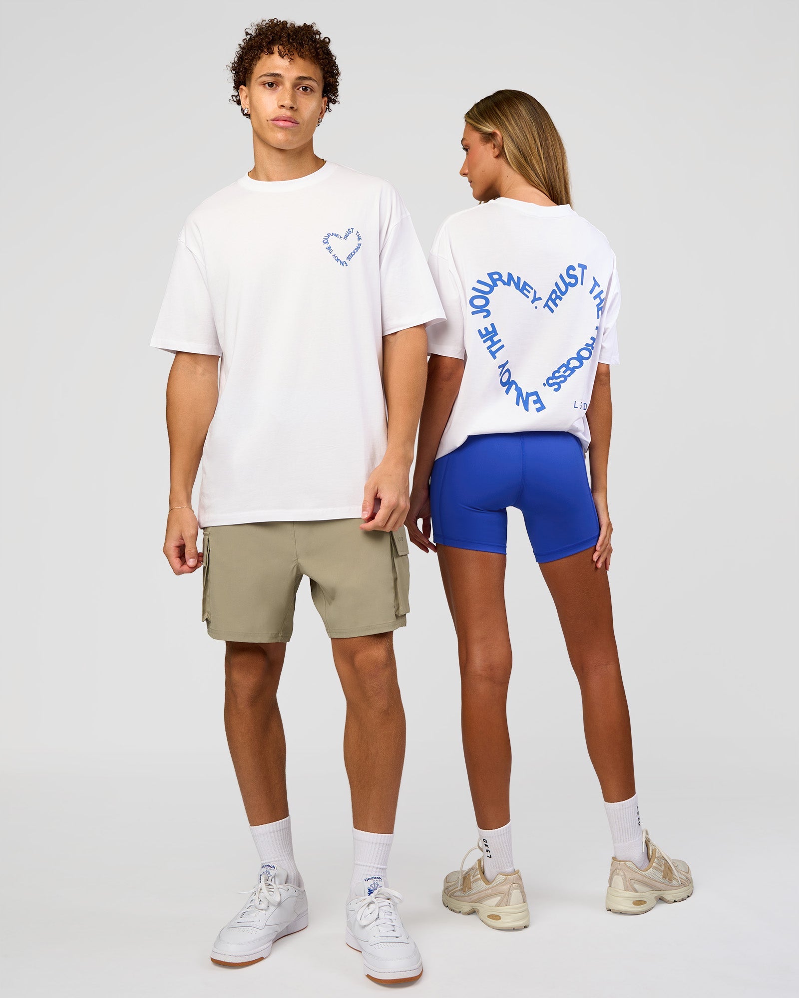 Duo wearing Love The Process FLXCotton Oversize Tee - White-Electric Indigo | Model:Both | Size:Duo