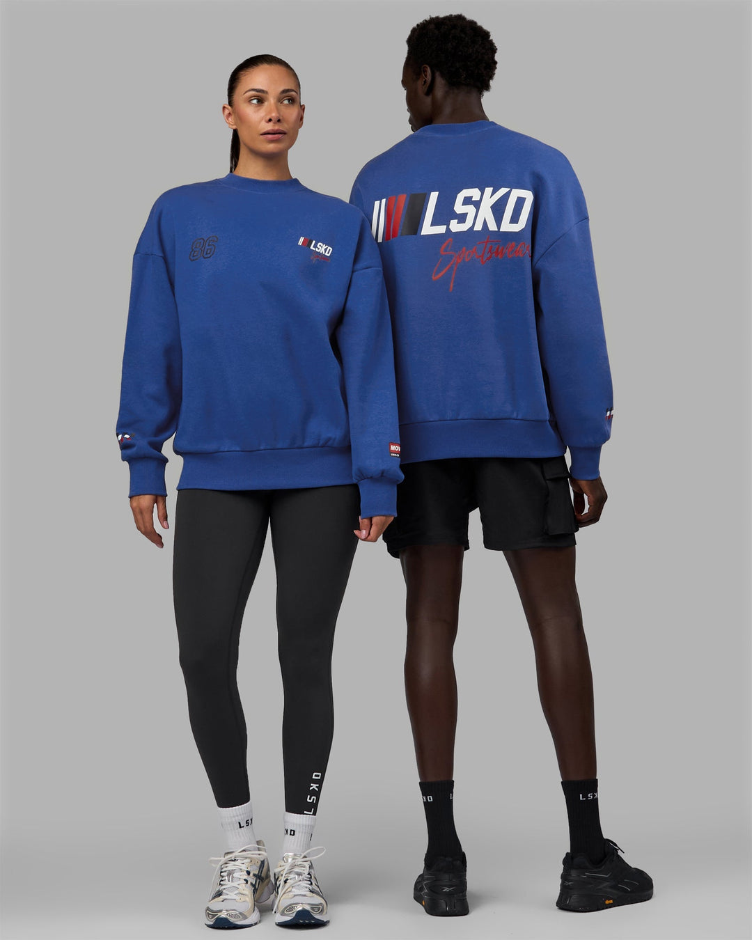 Duo wearing Unisex Redline Sweater Oversize - Power Cobalt-White