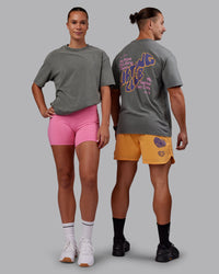 Duo wearing Rise & Lift Washed FLXCotton Oversized Tee - Graphite-Purple Opulence | Model:Both | Size:Duo