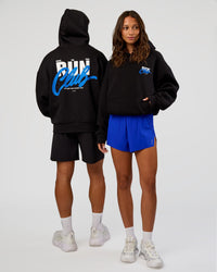 Duo wearing Run Club Script Oversized Hoodie - Black-Palace Blue | Model:Both | Size:Duo