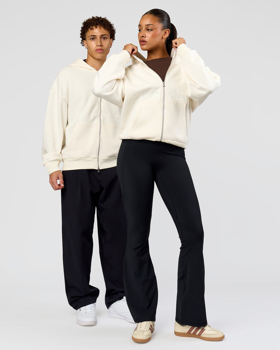 Duo wearing Shadow Mode Oversized Zip Through Hoodie - Off White | Model:Both | Size:Duo - view 1