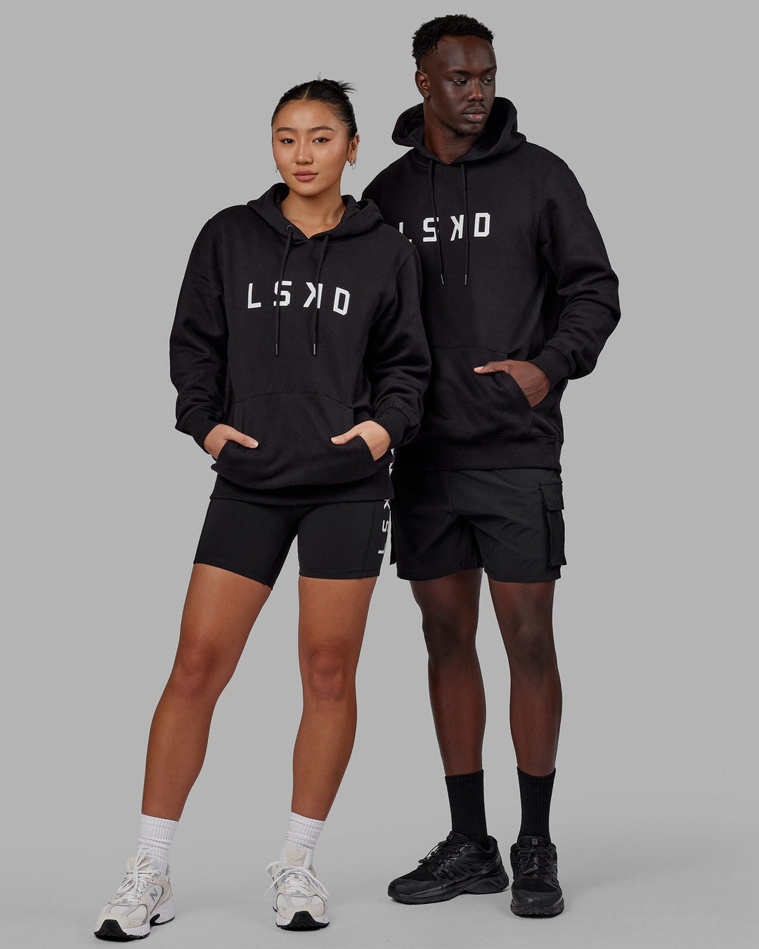 Duo wearing Unisex Structure Hoodie - Black-White