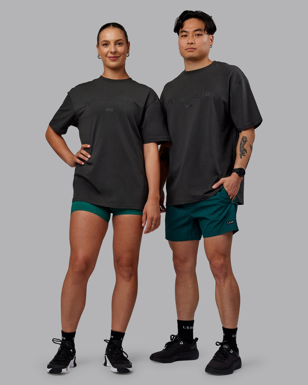 Duo wearing Unisex 1% Better FLXCotton Tee Oversize - Pirate Black-Black