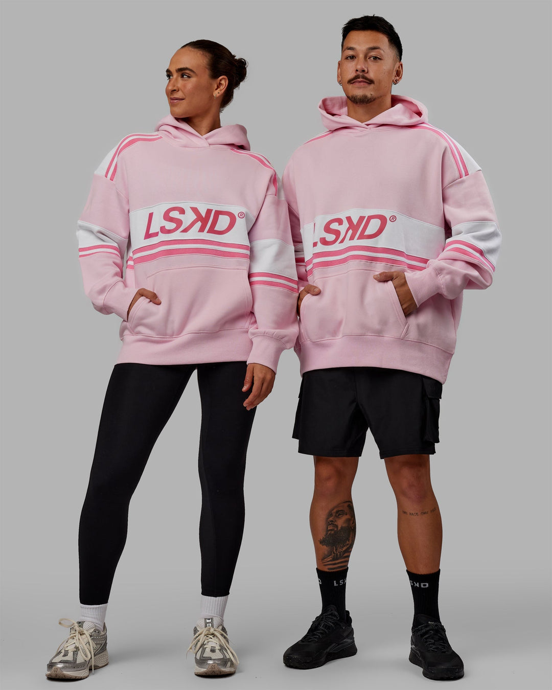 Duo wearing Unisex A-Team Hoodie Oversize - Petal Pink-White