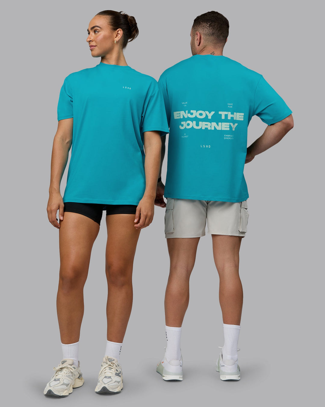 Duo wearing Unisex Enjoy the Journey Value Series FLXCotton Tee Oversize - Bluebird-Surf Spray