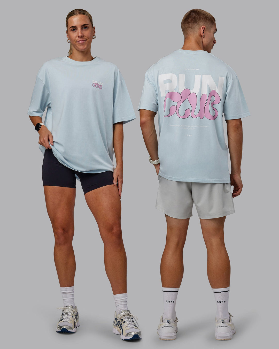 Duo wearing Unisex Gone Running FLXCotton Tee Oversize - Skyride-Bubblegum