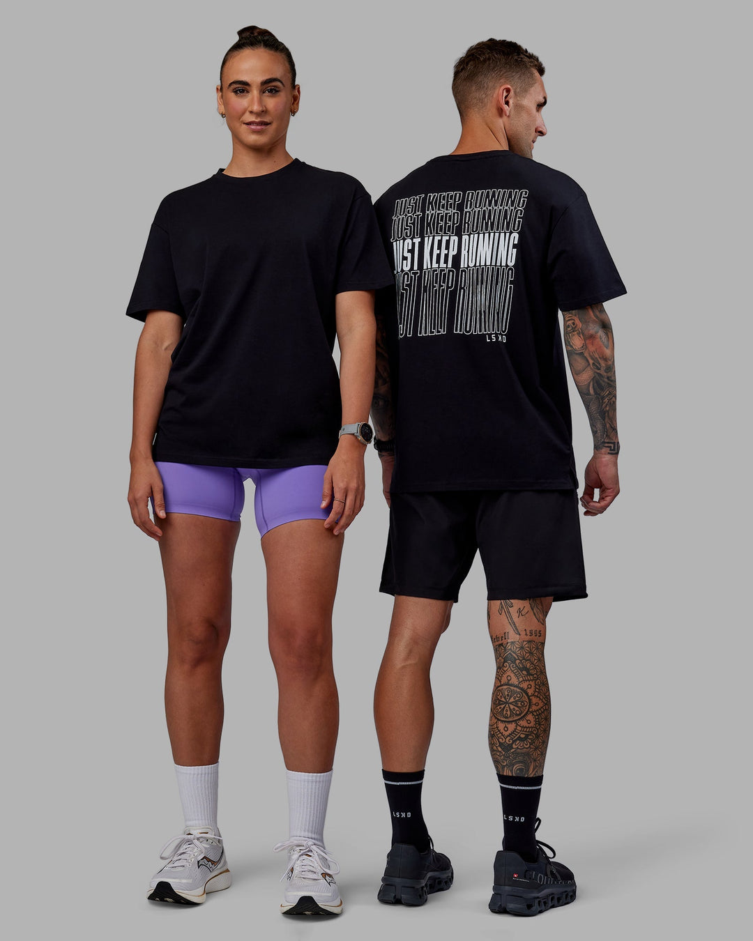 Duo wearing Unisex Keep On Running FLXCotton Tee Oversize - Black-White