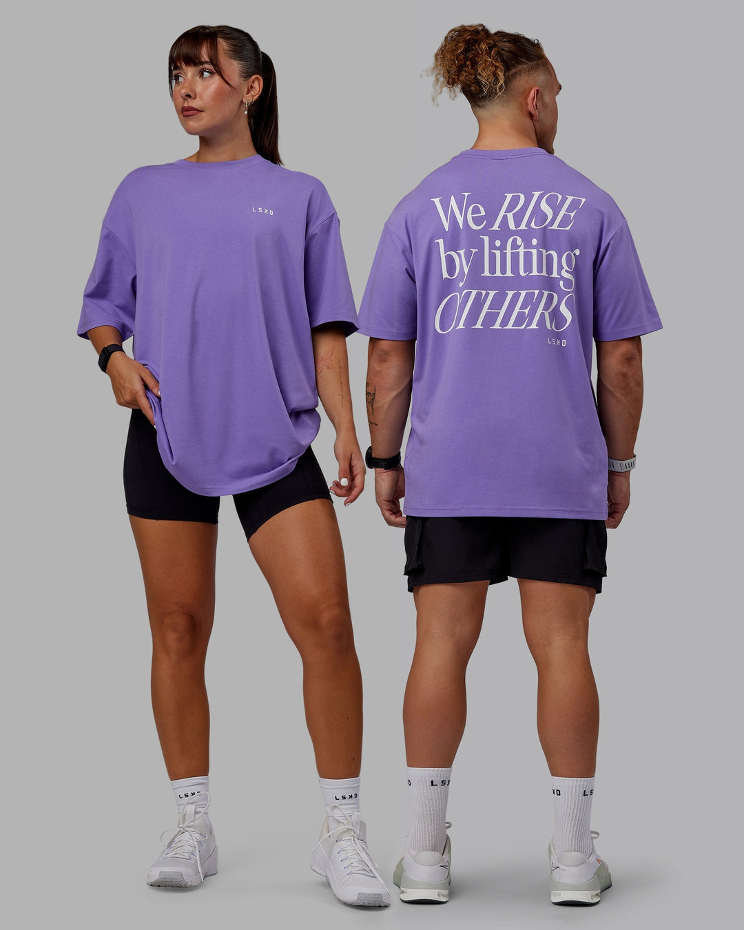 Duo wearing Unisex Lift-Up FLXCotton Tee Oversize - Dahlia Purple