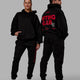 Duo wearing Unisex Lifting Club Hoodie Oversize - Black-Red