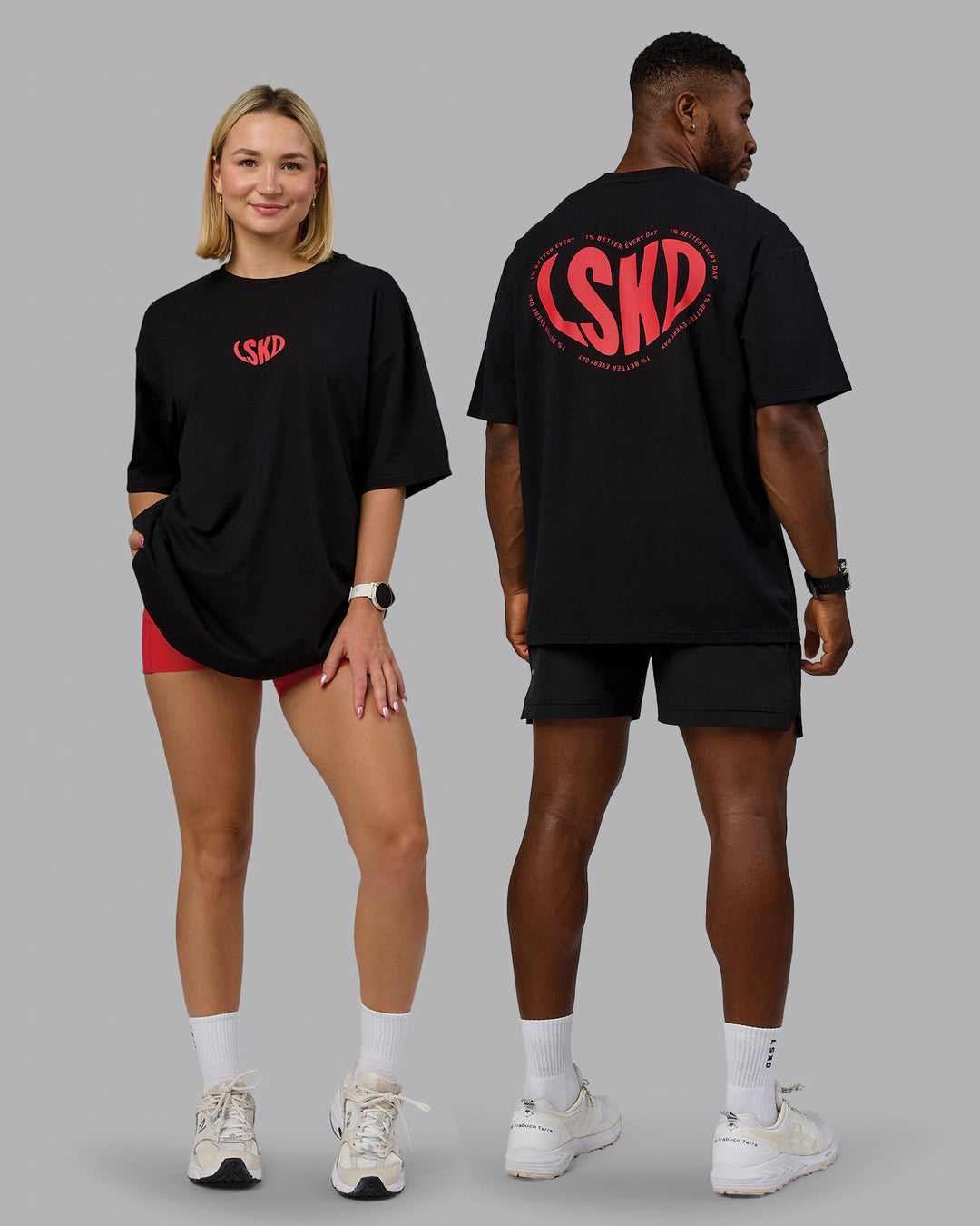 Duo wearing Unisex Love To Train FLXCotton Tee Oversize in Black-Scarlet | Size:Duo