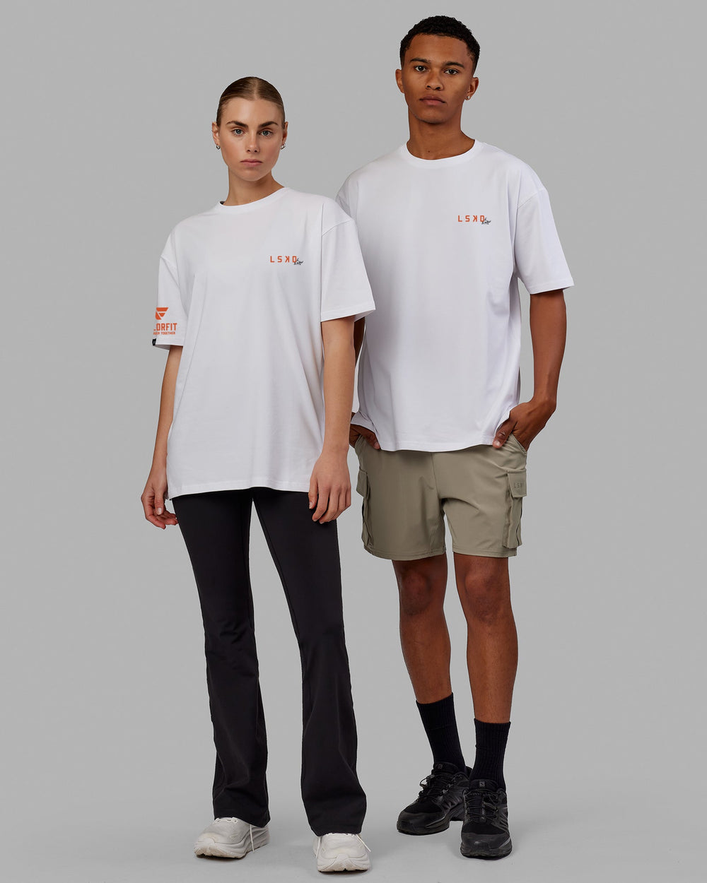 Duo wearing Unisex Run Across Texas FLXCotton Tee Oversize - White-Texas