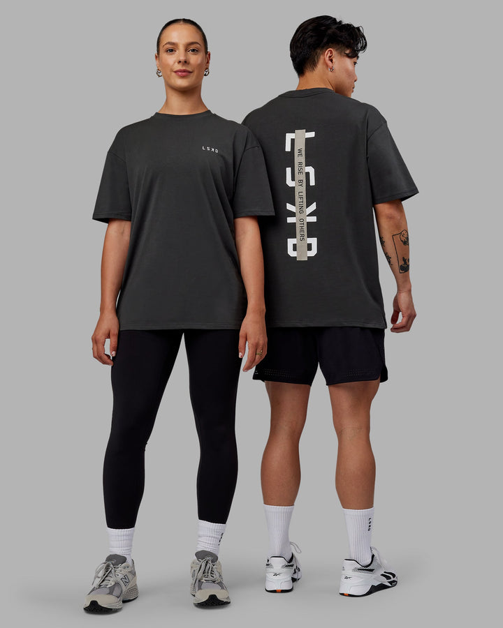 Duo wearing Unisex Strike Through FLXCotton Tee Oversize - Pirate Black-Black
