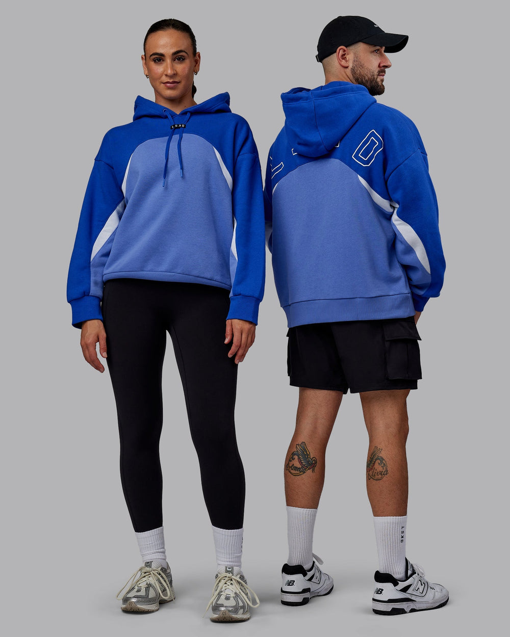 Duo wearing Unisex Y2K Concept Panel Hoodie - Power Cobalt-White