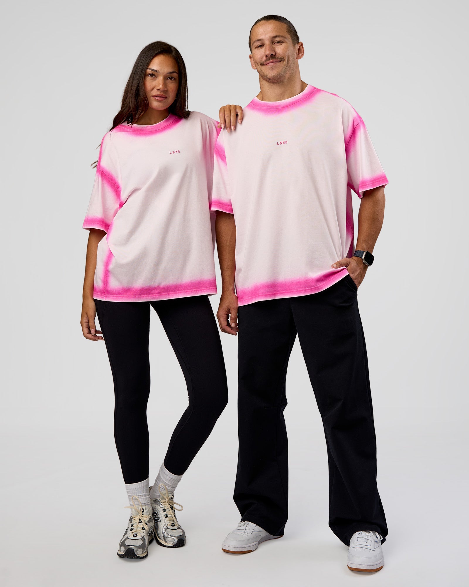 Duo wearing Urban Blur Heavyweight Unisex Oversized Tee - Off White-Ultra Pink | Model:Both | Size:Duo