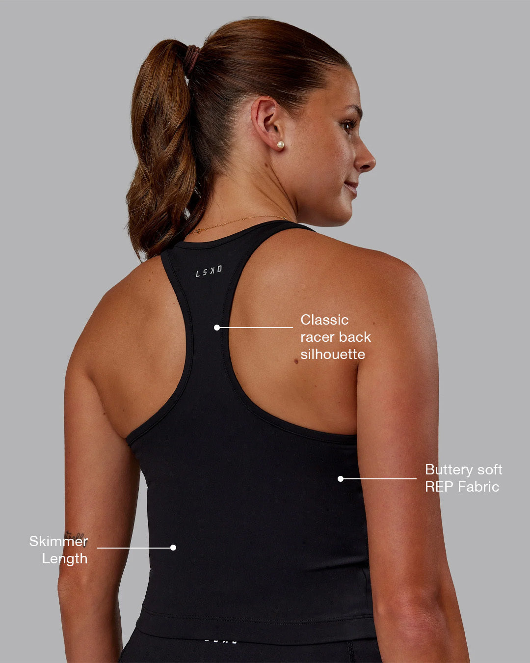 Woman wearing Flow Performance Tank - Black | Model:Phoebe | Size:S