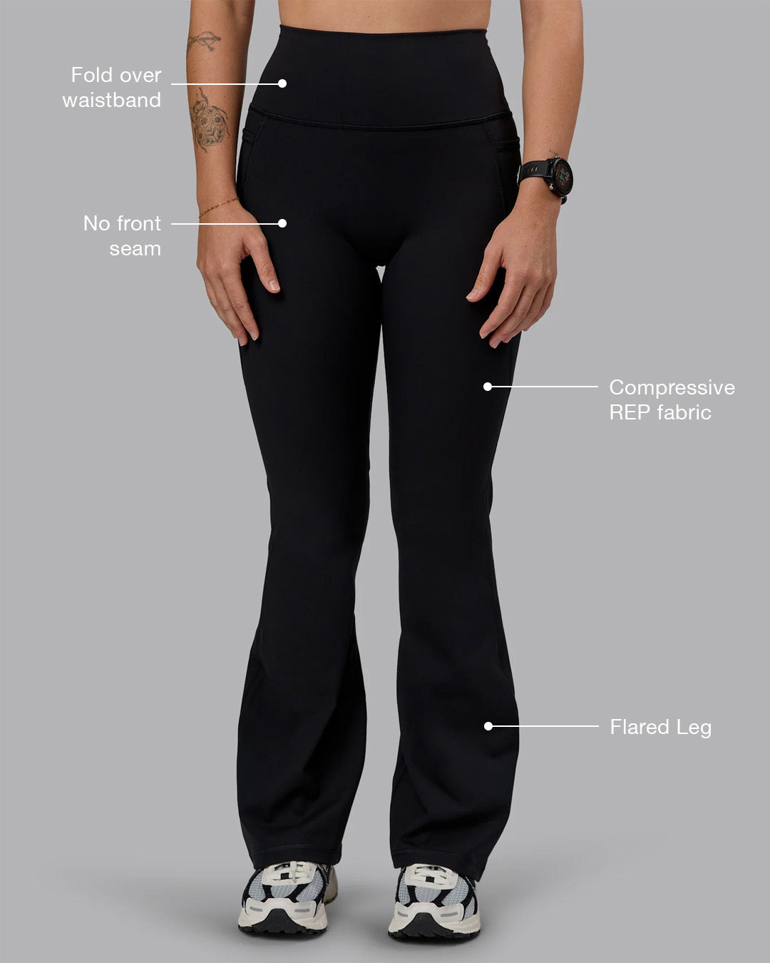 Woman wearing Fusion Ultra High-Rise Flared Petite Legging Pockets - Black| Model:Bianca | Size:S
