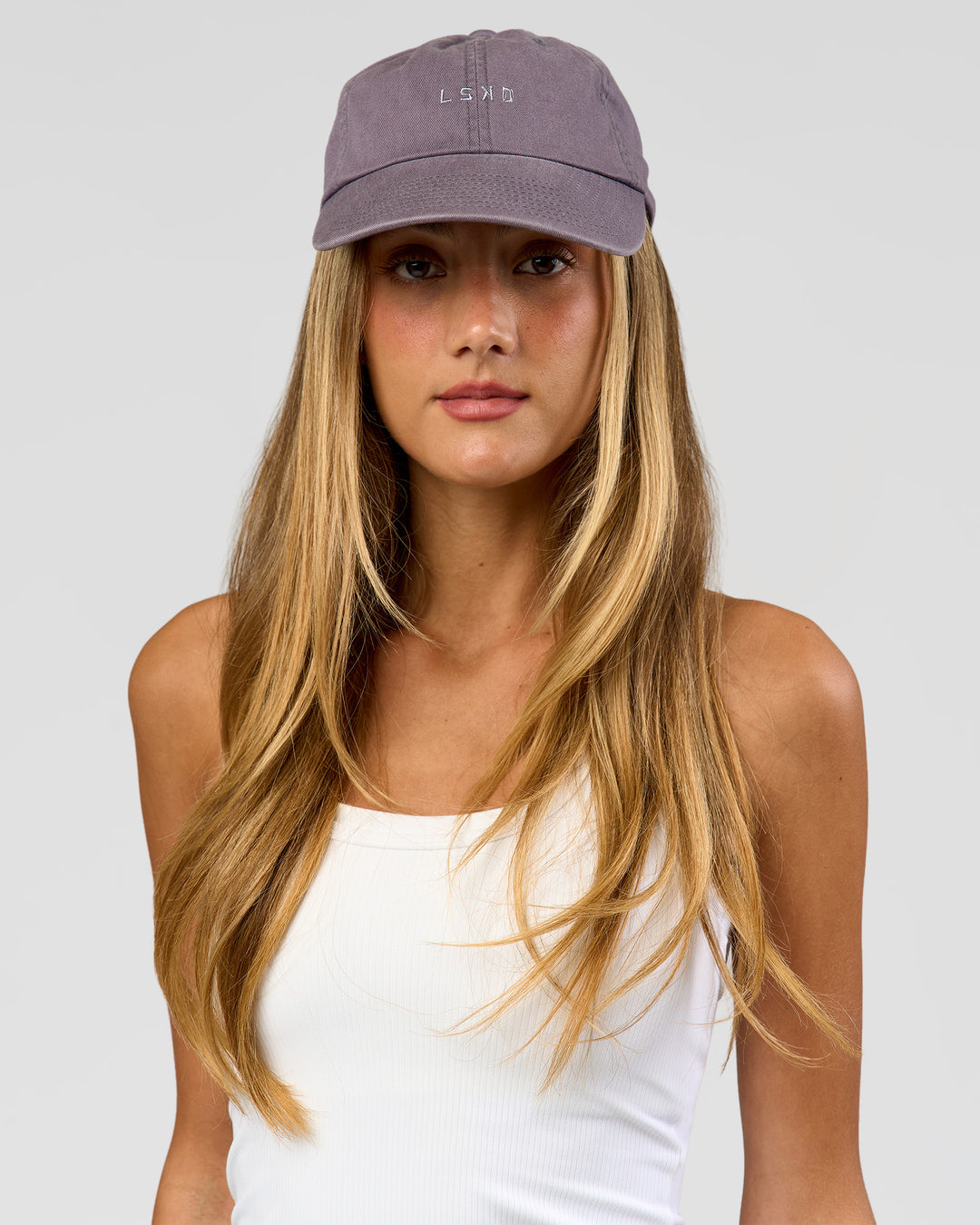 Female wearing All Day Cap in Duskstone