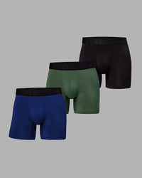 Man wearing MVP Trunks 3 Pack - Black/Cilantro/Midnight Blue