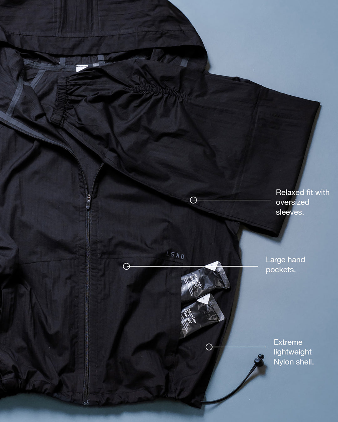 Woman wearing Run Light Jacket - Black | Model:Brylee | Size:XS