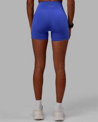 Woman wearing Flux Ultra High-Rise 4" Short Pockets - Power Cobalt