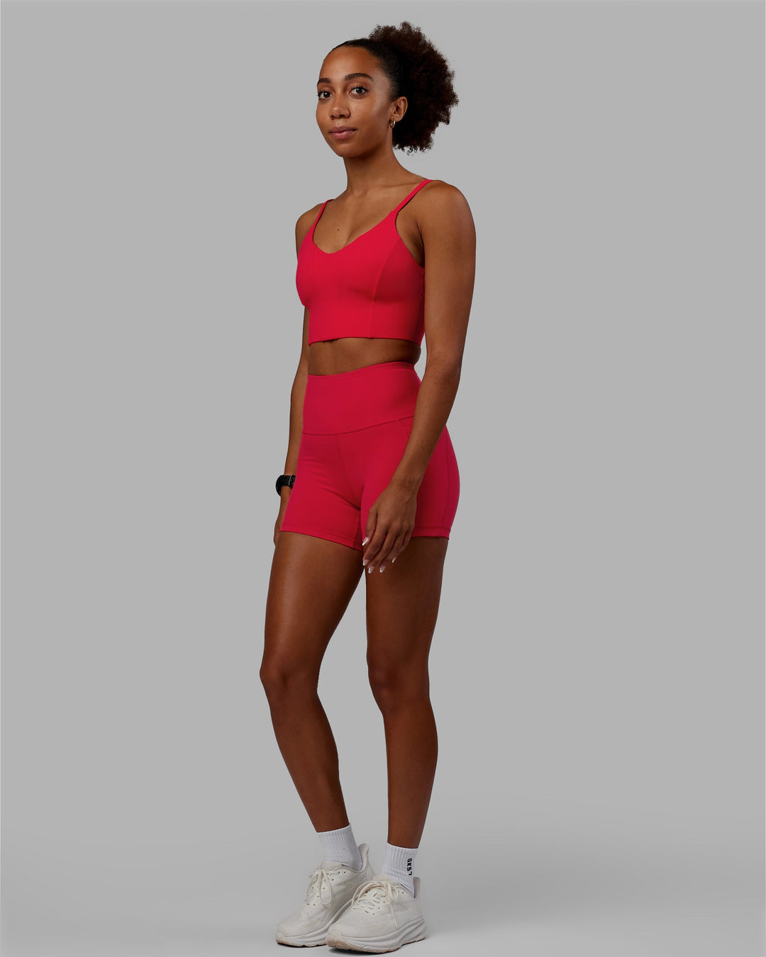 Woman wearing Flux Ultra High-Rise 4" Short Pockets - Scarlet
