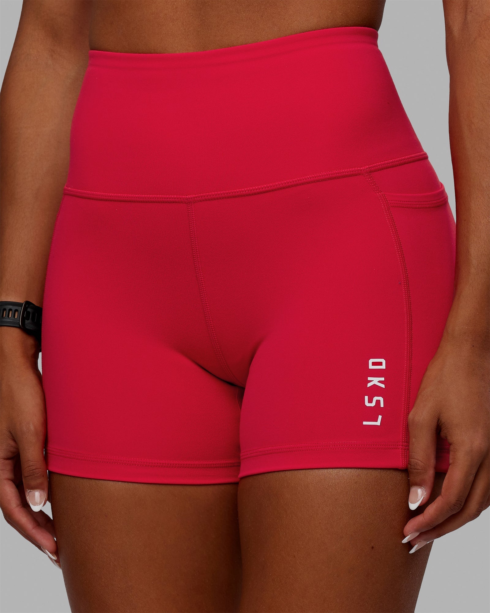 Woman wearing Flux Ultra High-Rise 4" Short Pockets - Scarlet