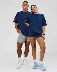Duo wearing GG Heavyweight Oversized Tee - Future Navy | Model:Grace | Size:S | Model:Malebo | Size:M