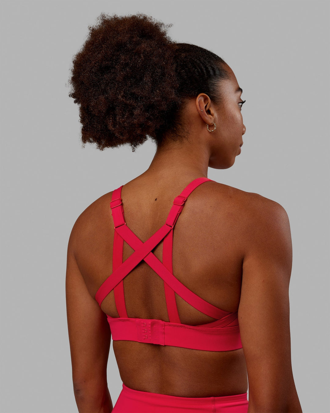 Woman wearing Interval Sports Bra - Scarlet