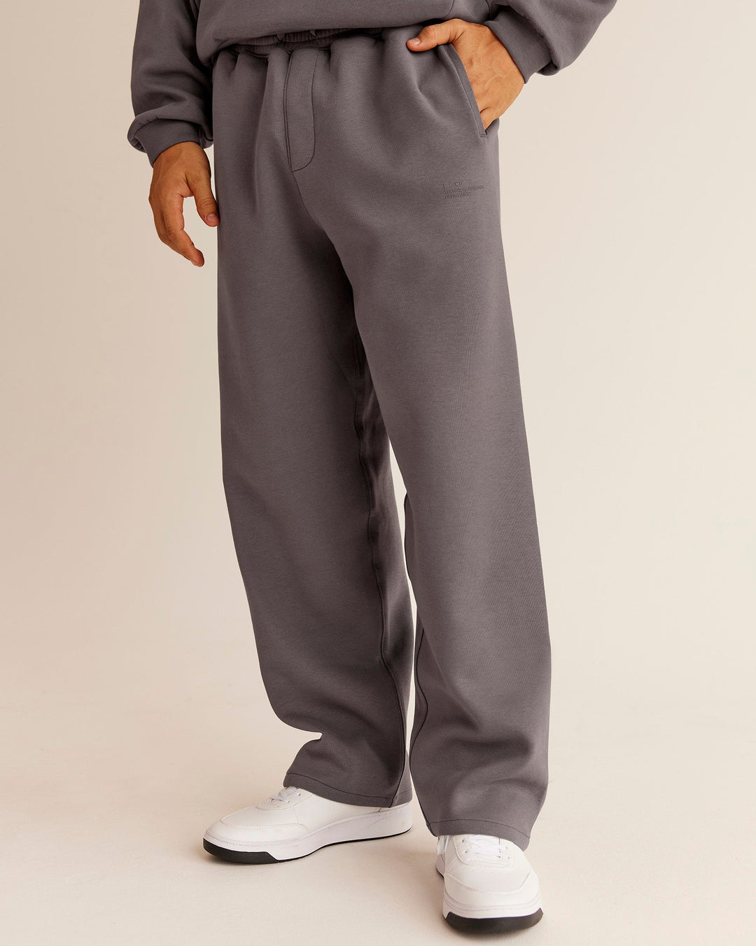 Man wearing AfterDark ZeroCrease Straight Leg Pant - Duskstone | Model:Jackson | Size:L