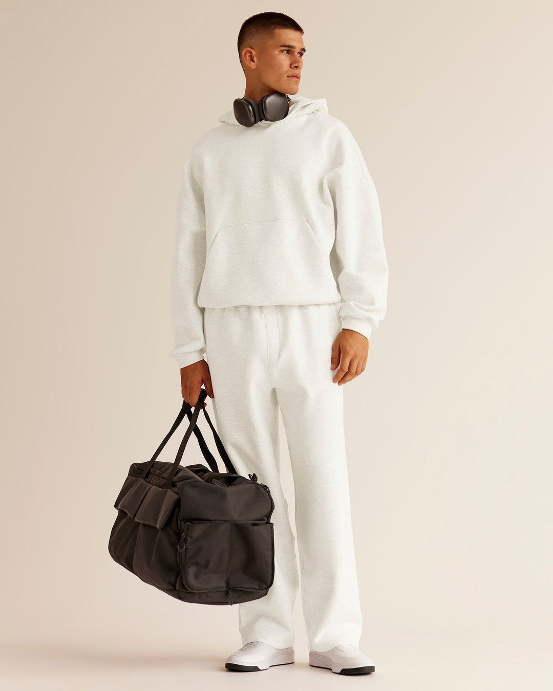 Man wearing AfterDark ZeroCrease Straight Leg Pant - Silver Marl | Model:Jackson | Size:L