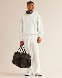 Man wearing AfterDark ZeroCrease Straight Leg Pant - Silver Marl | Model:Jackson | Size:L