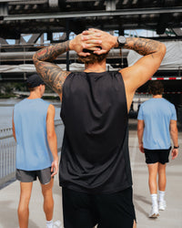 Man wearing AirTrack Muscle Tank - Black | Model:Zane | Size:L