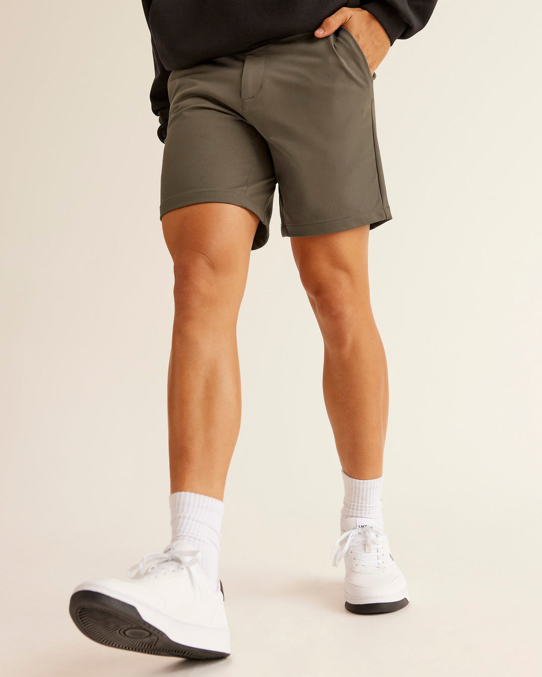 Man wearing All Day ZeroCrease™ Regular 8" Short - Walnut Grey | Model:Jackson | Size:34