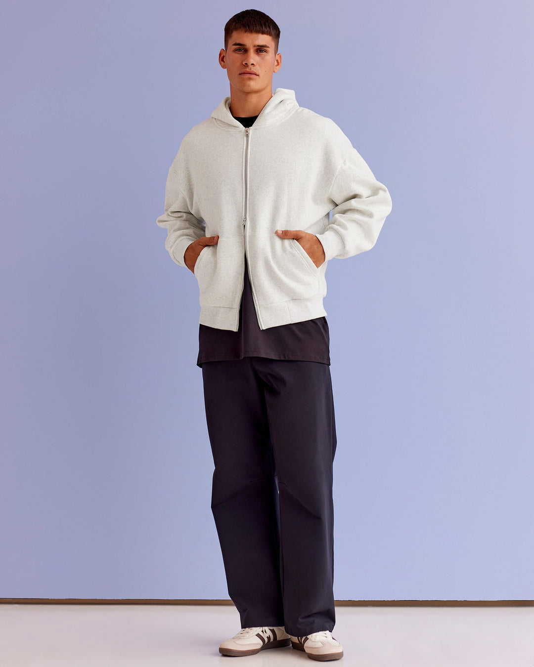 Man wearing Base Zip Through Oversized Hoodie - Silver Marl | Model:Jackson | Size:L