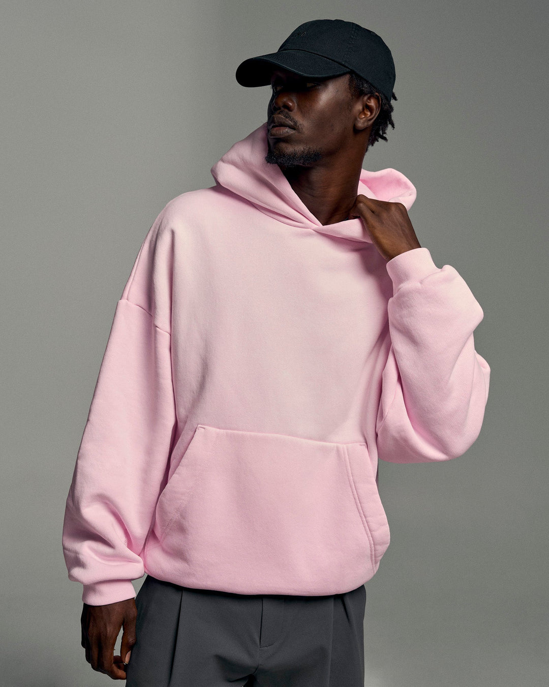 Man wearing Memory In Motion Ultra Heavyweight Washed Hoodie - Marshmallow Washed | Model:Okello | Size:L