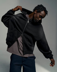 Man wearing Memory in Motion Ultra Heavyweight Zip Thru Hoodie - Black Washed | Model:Okello | Size:L