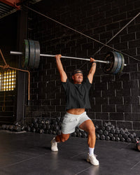 Man wearing Oversized Heavyweight Boxed Tee - Washed Black | Model:Moses | Size:L