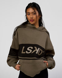 Woman wearing 
A-Team Oversized Hoodie - Walnut Grey-Caviar | Model:Loren | Size:L
