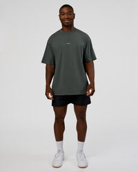 Man wearing Abstract Haze FLXCotton Tee - Carbon Green-Cantaloupe | Model:Sam | Size:L