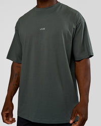 Man wearing Abstract Haze FLXCotton Tee - Carbon Green-Cantaloupe | Model:Sam | Size:L