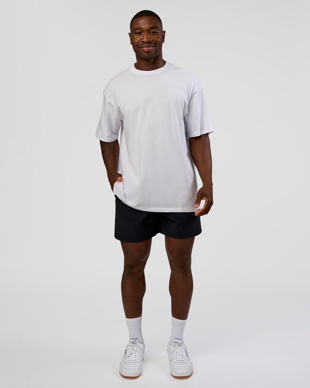 Man wearing Abstract Haze FLXCotton Tee - White-Blue Aura | Model:Sam | Size:L