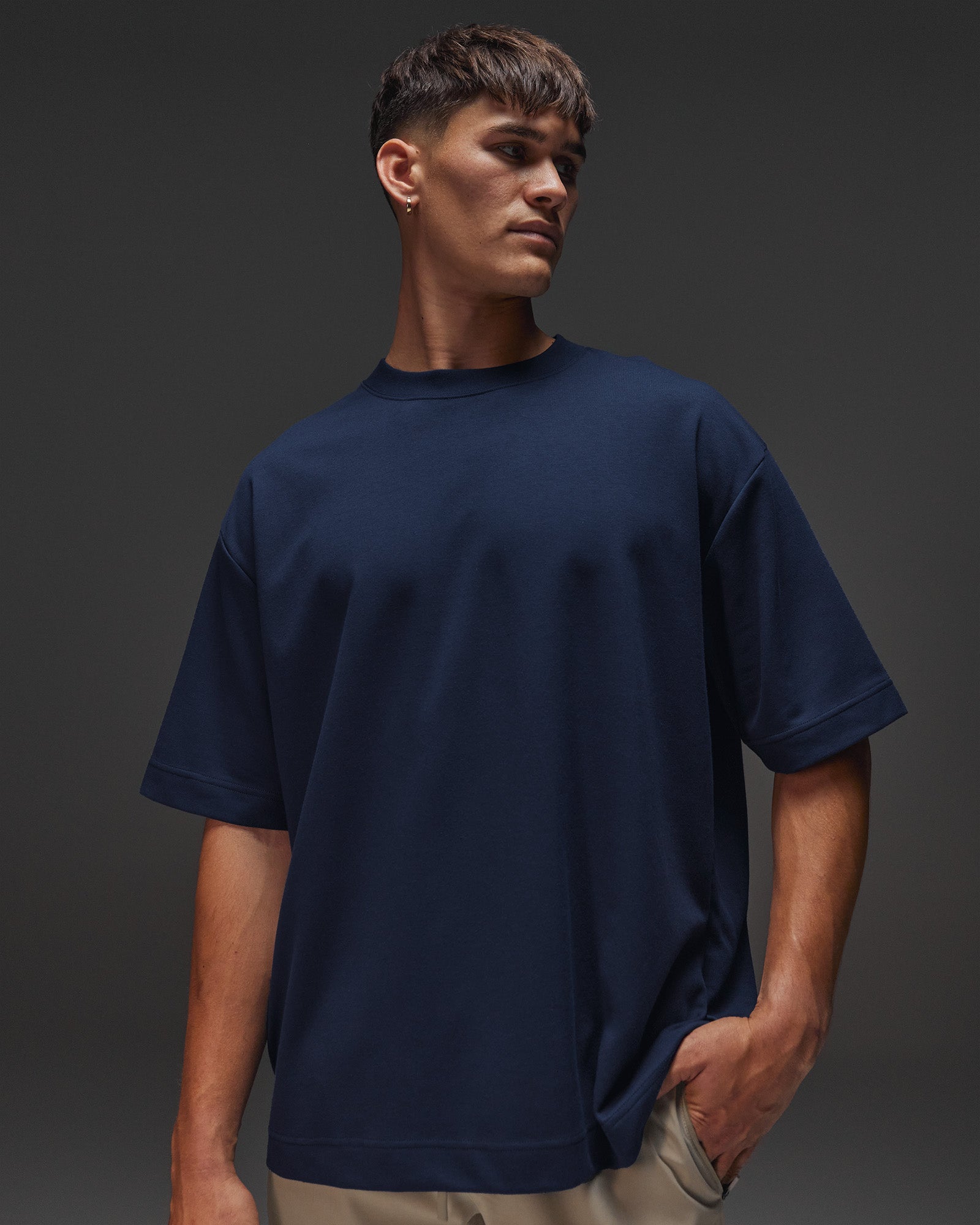 Man wearing AfterDark ZeroCrease Oversized Tee - Future Navy | Model:Jackson | Size:L