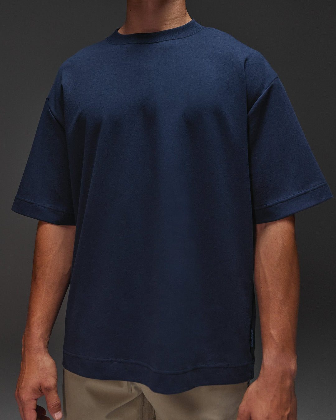 Man wearing AfterDark ZeroCrease Oversized Tee - Future Navy | Model:Jackson | Size:L