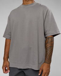 Man wearing AfterDark ZeroCrease Oversized Tee - Storm Front | Model:Xav | Size:L